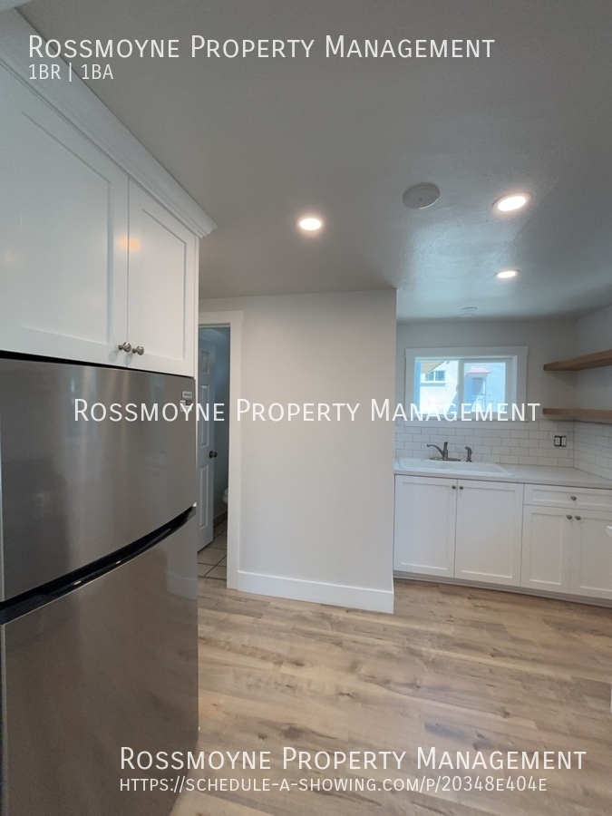 718 E. Chevy Chase Dr. - F Glendale kitchen with faux wood floors