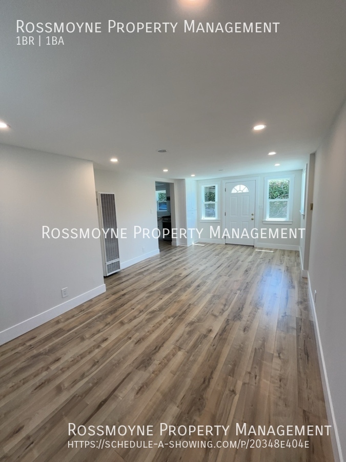 718 E. Chevy Chase Dr. - F Glendale living room with faux wood floors